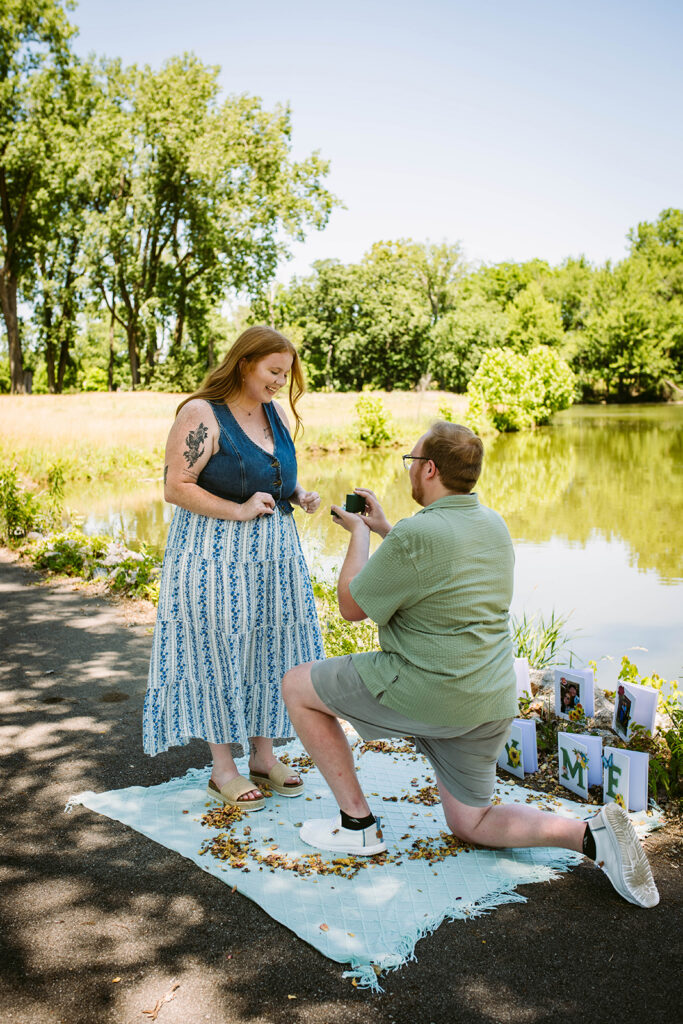 surprise proposal during engagement session at Greenhurst Commons in Auburn Indiana